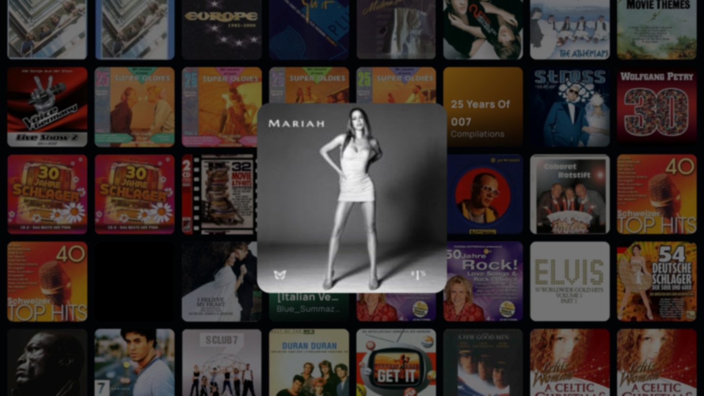 CoverDrift Cover Wall on a TV: a full-screen grid of real album covers